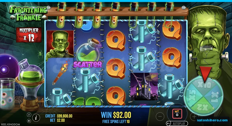 Multiplier wheel spins beside wild-filled reels